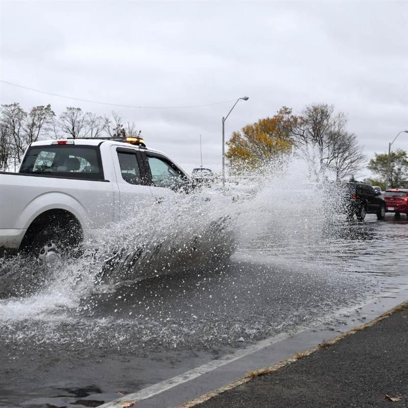 Car on a flooding road