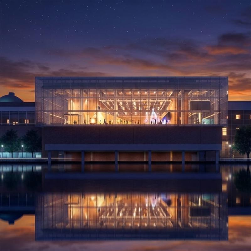 The Public Science Common exterior in the evening.